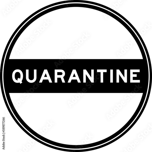Black color round seal sticker in word quarantine on white background