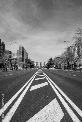 Paseo de la Castellana in Madrid, capital of Spain in black and white