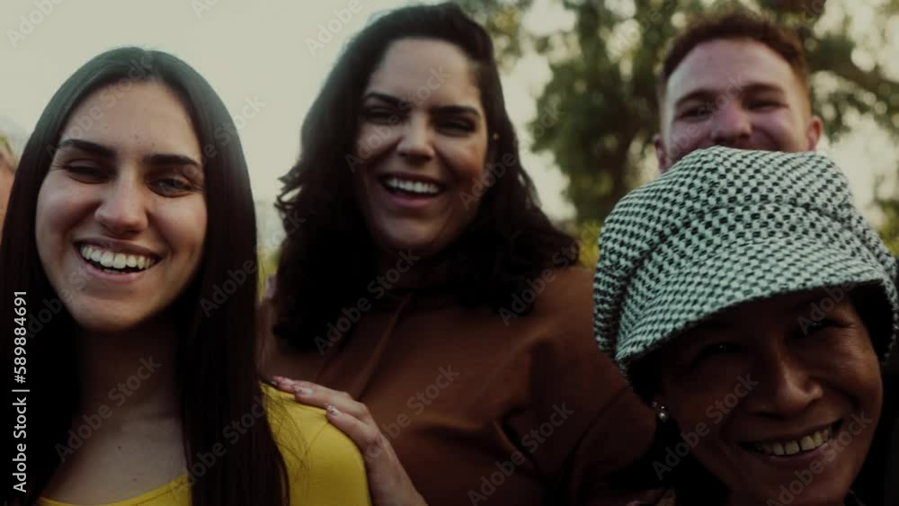 Happy multigenerational people with different ethnicity having fun smiling into the camera - Diversity concept Happy multigenerational people with different ethnicity having fun smiling into the camera - Diversity concept