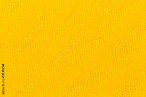 The Yellow color fabric cloth polyester texture and textile background.