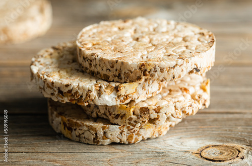 Close-up  rice cakes on wooden background. Tasty crisps  snack with health benefits.