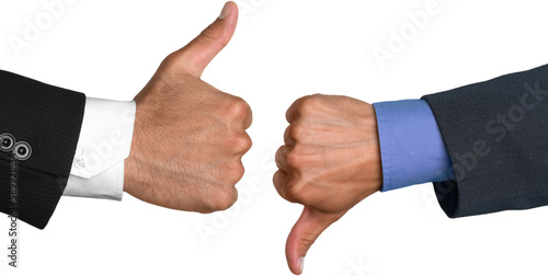 Obraz na plátně Closeup of Two Businessmen Showing Thumbs Up and Thumbs Down