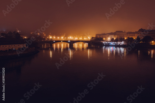 Vltava river at night. Bridge in Prague. Traveling, historic architecture concept