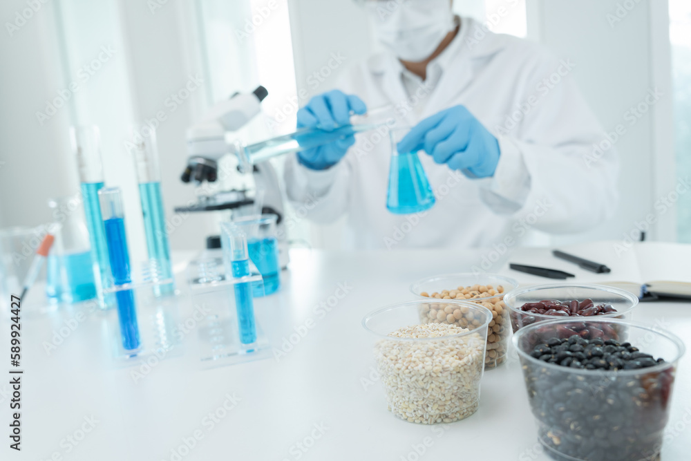 Scientist check chemical whole grains residues in laboratory. Control experts inspect the concentration of chemical residues. hazards, standard, prohibited substances, contaminate, Microbiologist Scientist check chemical whole grains residues in laboratory. Control experts inspect the concentration of chemical residues. hazards, standard, prohibited substances, contaminate, Microbiologist