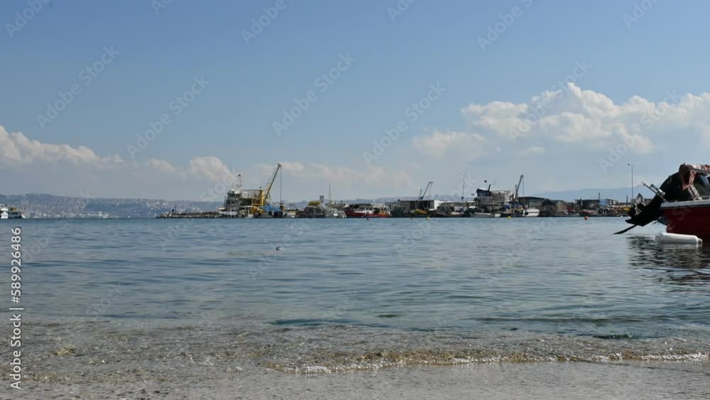 4k. time lapse. small waves and fishing boats in the sea 4k. time lapse. small waves and fishing boats in the sea