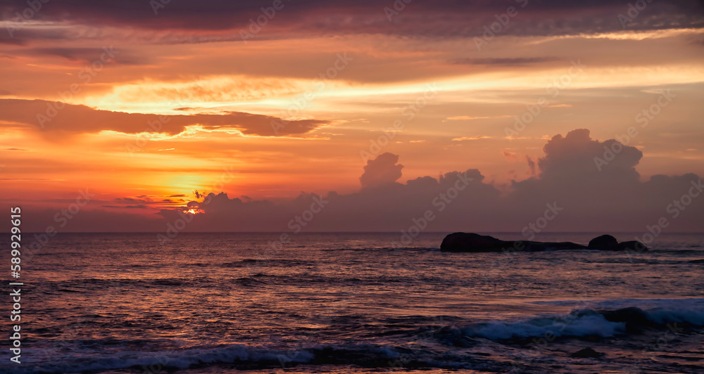 Tropical natural sea landscape sunset for backgrounds, amazing tropic scenery. Fantastic sunrise on ocean for vacation stylish design. Concept of summer vacation and travel holiday. Copy ad text space