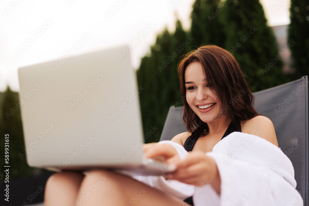 Successful girl working on the beach and relaxing Successful girl working on the beach and relaxing