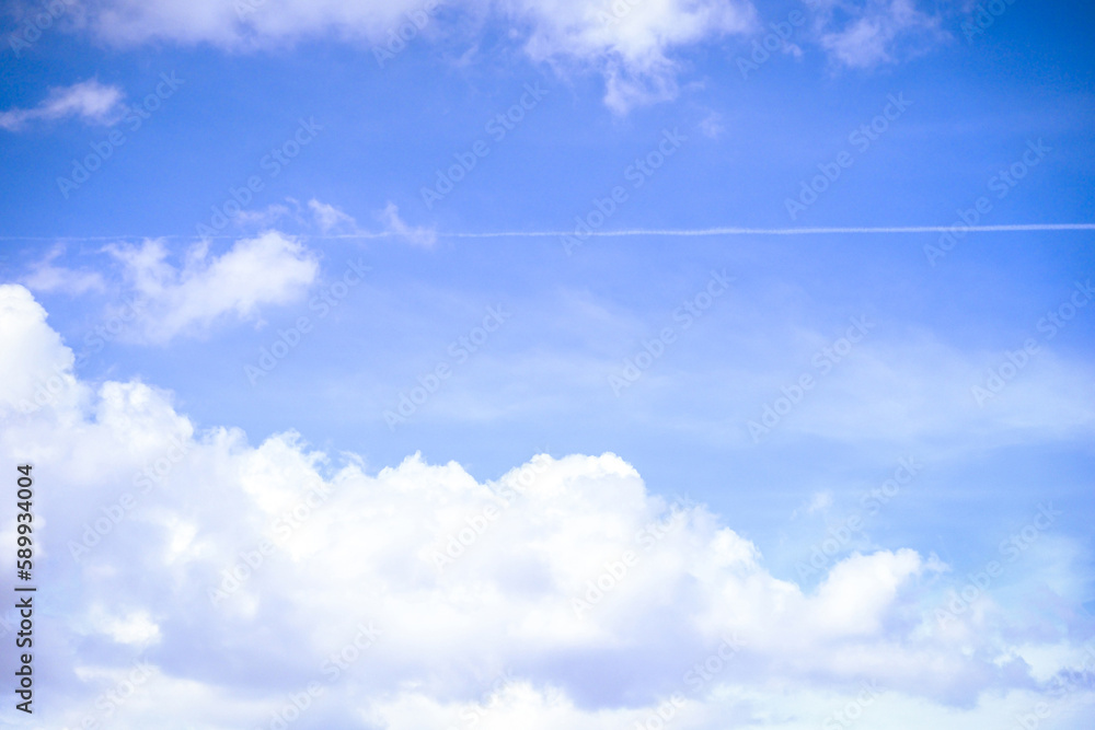 Blue sky background with tiny clouds Blue sky background with tiny clouds