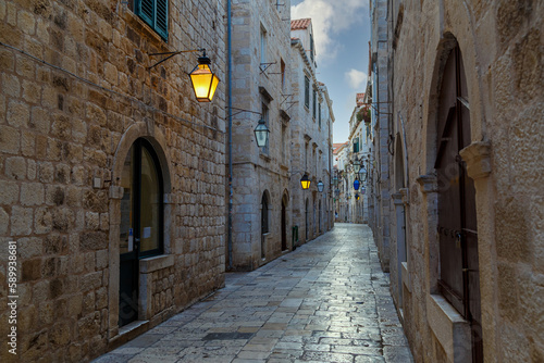 Medieval stone street, illuminated by lanterns. Dubrovnik. Croatia. Europe © anatoliil