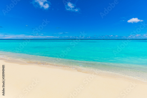 Sunny beach landscape. Relaxing beachfront sand sea waves blue sky horizon. Tranquil freedom Mediterranean tropical nature background. Peaceful happy seascape horizon. Summer travel closeup sunlight