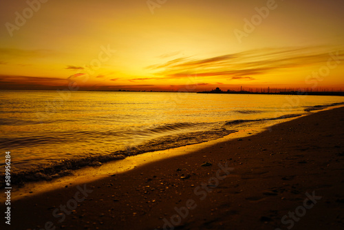 Fototapeta Naklejka Na Ścianę i Meble -  Sunset on the beach in late summer. St Kilda city beach of Melbourne, Australia.