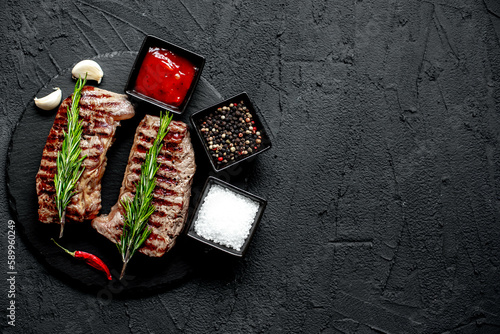 grilled beef steak on stone background  with copy space for your text