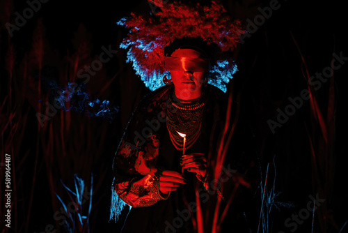 Ukrainian woman as motanka with candle. Ribbon around eyes as on ritual rag doll