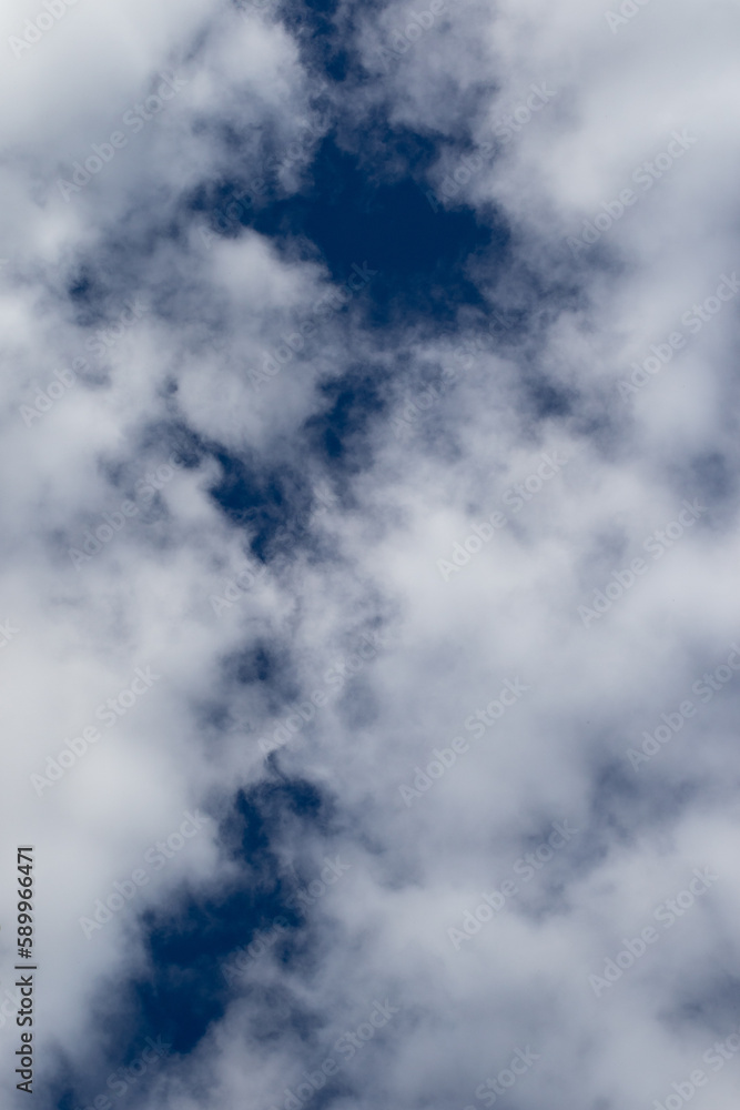 Clouds shaped like a puckered scar Clouds shaped like a puckered scar