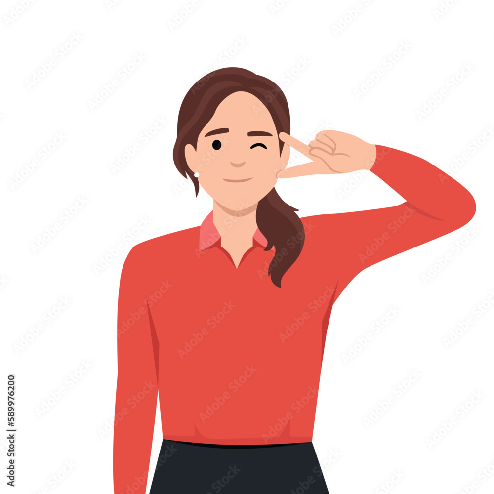 Happy girl shows hand gesture, victory sign. Portrait of beautiful young woman Happy girl shows hand gesture, victory sign. Portrait of beautiful young woman