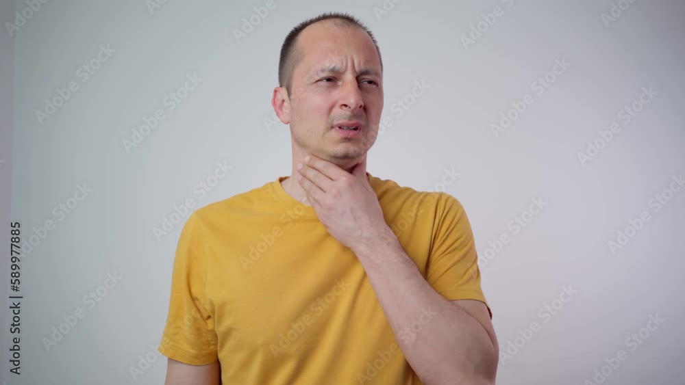 man suffering throat pain man suffering throat pain