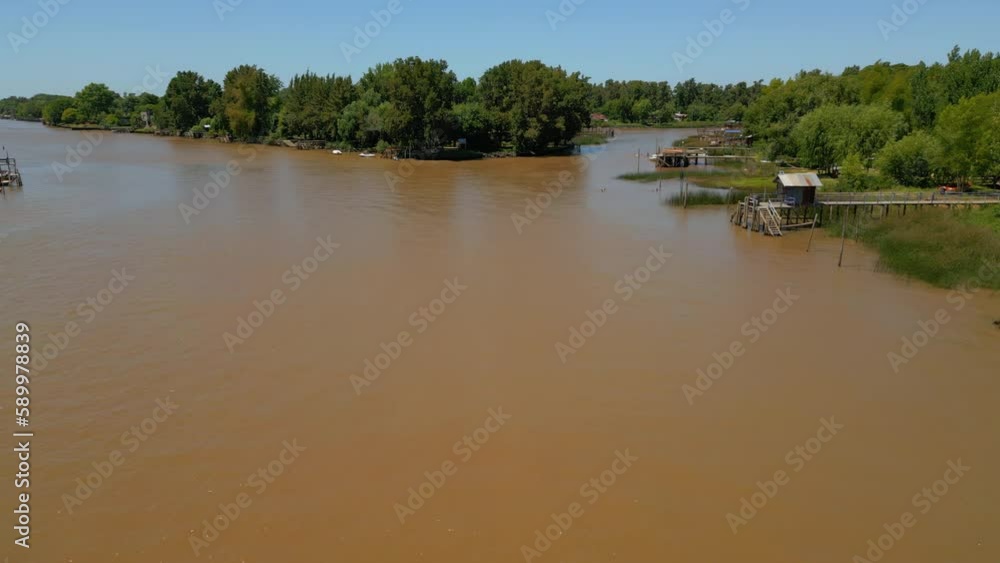 Aerial View of River and Nature with Docks and Boats Aerial View of River and Nature with Docks and Boats