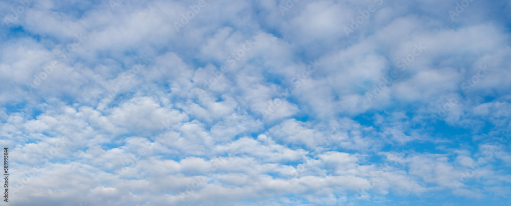 Blue sky with white cirrus clouds, panorama