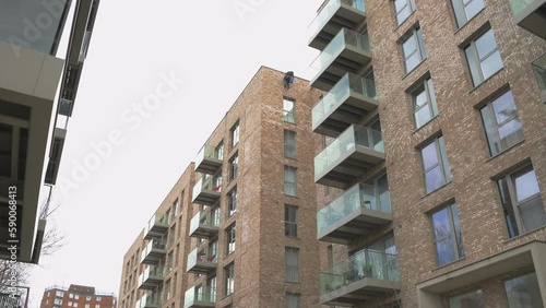 London, United Kingdom, 5 April 2023: Architectural detail of a modern apartment building in Newham.Redevelopment of a old West Ham United Football Stadium in Green Street