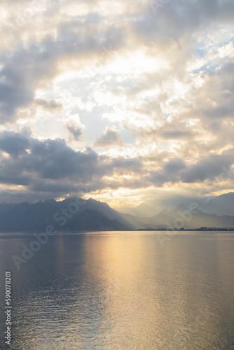 Landscape of Mediterranean sea with mountains in the distance during the sunset  Antalya  Turkey