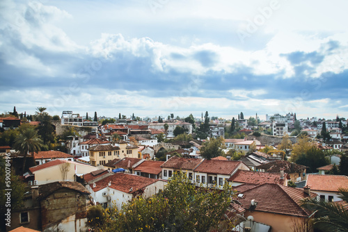 Cityscape of Antalya coast houses with clouds in the sky