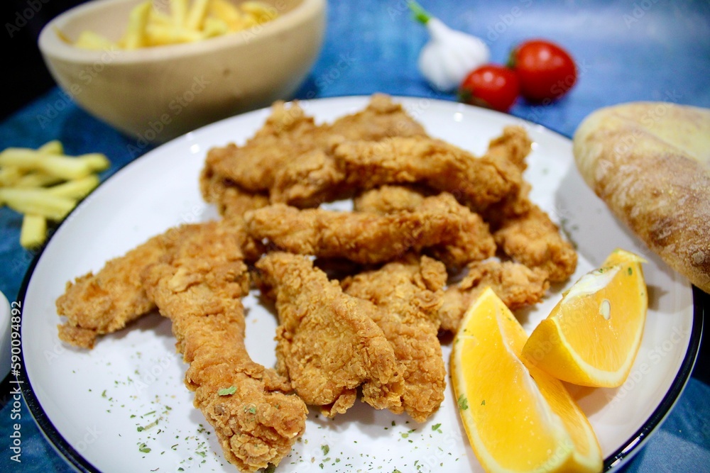 Deepfried chicken with french fries Deepfried chicken with french fries