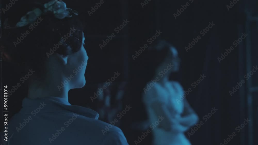 Two ballerinas from behind the scenes watch the performance on stage. The secret of the ballet. Intrigues. Spying on competitors. Two ballerinas from behind the scenes watch the performance on stage. The secret of the ballet. Intrigues. Spying on competitors.