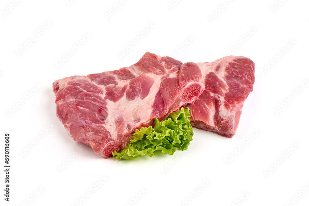 Raw Pork ribs with lettuce isolated on white background.