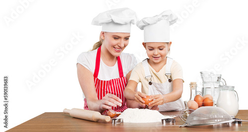 Portrait of adorable little girl and her mother baking together