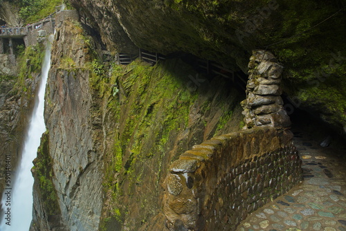 Tunnel on hiking track at waterfall Pailon del Diablo at Banos, Tungurahua Province, Ecuador, South America 