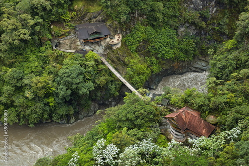 Footbridge over Rio Pastaza under the waterfall Pailon del Diablo at Banos, Tungurahua Province, Ecuador, South America
