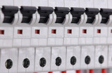 automatic current switches for protection of electrical loads installed in an electrical switchboard.