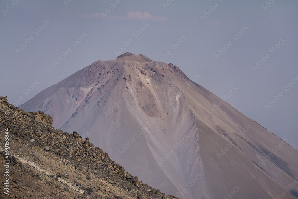 The rocky slope of Mount Ararat and the rocky peak of Little Ararat, on a sunny summer day
