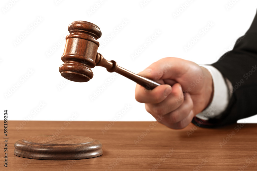 Male hand with wooden judge hammer on background Male hand with wooden judge hammer on background