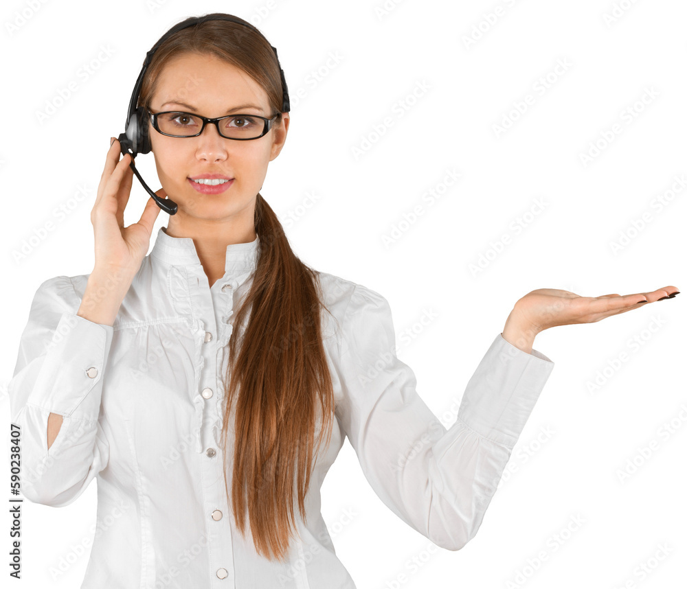 Young Friendly Businesswoman Talking on Headset and Pointing Using Palm - Isolated Young Friendly Businesswoman Talking on Headset and Pointing Using Palm - Isolated