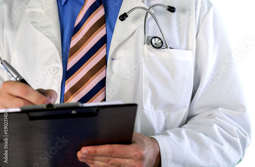 Portrait of doctor with folder in medical office