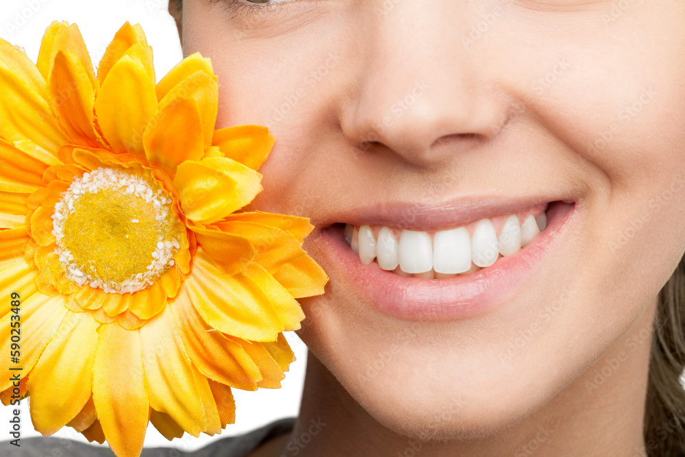 Young woman with yellow flower isolated on white background Young woman with yellow flower isolated on white background