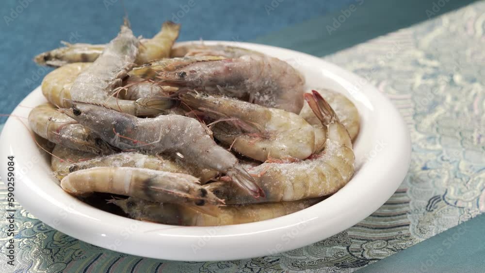 Frozen green shrimp under monochrome background monochrome Frozen green shrimp under monochrome background monochrome