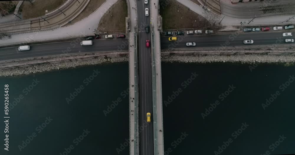 Topdown Aerial view of Budapest traffic during a cloudy day. Bridge over the Danube river Topdown Aerial view of Budapest traffic during a cloudy day. Bridge over the Danube river