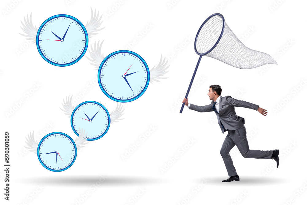 Deadline concept with businessman catching clocks