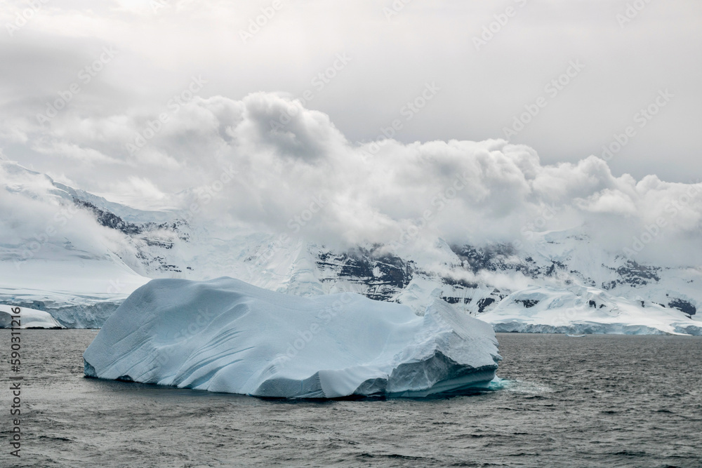 Iceberg floating in the Neumayer Channel at Anvers Island Antarctica Iceberg floating in the Neumayer Channel at Anvers Island Antarctica