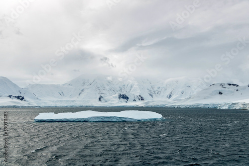 Snowy mountain scene from the Neumayer Channel in Antarctica