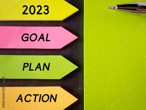 2023 goal plan action written on stickynote paper background. New year resolution concept. Inspirational quote.  photo