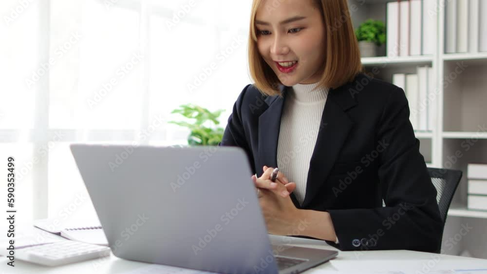 Businesswoman in office talking with colleague while webinar meeting on laptop. Businesswoman in office talking with colleague while webinar meeting on laptop.