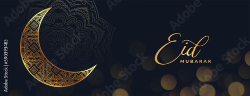 bokeh style eid mubarak greeting banner with golden islamic moon