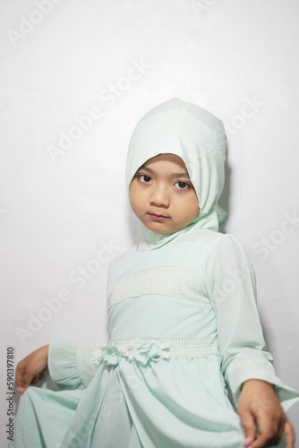 Expression portrait of a Muslim girl wearing a hijab