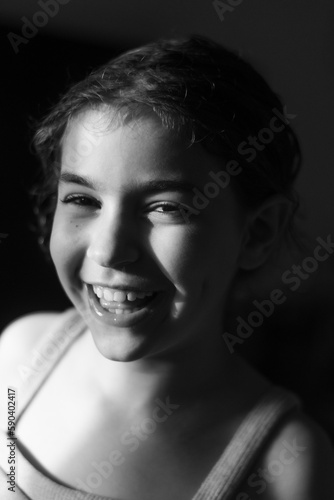 Isolated close up portrait of a beautiful nine year old girl