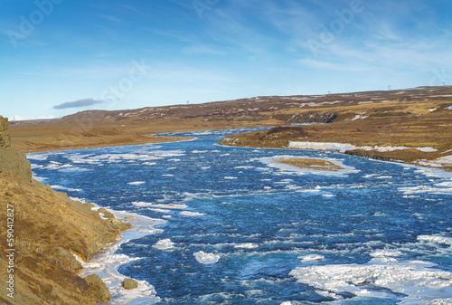 The Icelandic Hvita River starts at Hvítárvatn Glacier lake flowing 40km before dropping down into a narrow gorge at Gullfoss waterfall.