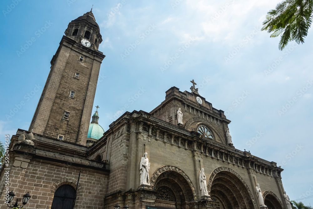 Intramuros, Manila, Philippines - The facade of Manila Cathedral during a hot sunny April.
