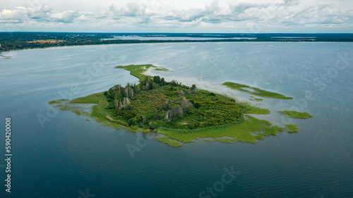 An aerial view on a small islet on the Naroch lake in Belarus photo